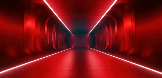Futuristic corridor with intense red neon lights, curved walls, and glowing symmetry vanishing point