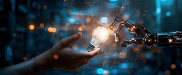 Human hand meeting robotic fingers in glowing AI network near a lightbulb core