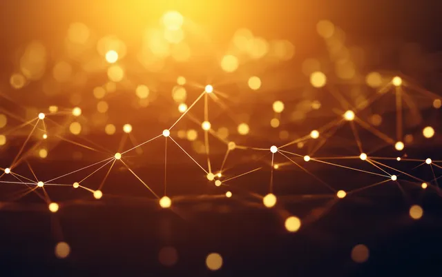 Glowing network of connected nodes with golden lines over a soft bokeh background