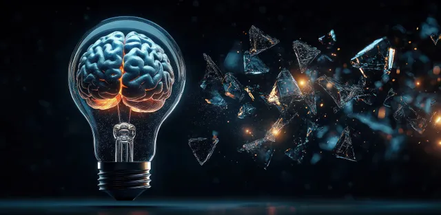 A brain inside a glowing light bulb illuminates dark space with floating shattered glass fragments.