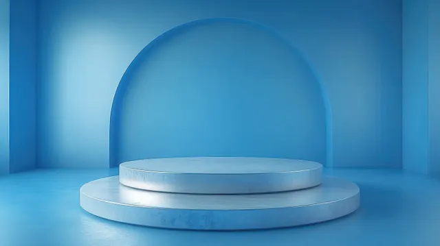 Minimal empty blue room showing a two-tier circular platform beneath a large arched opening.