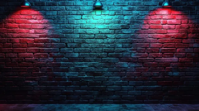 Three hanging lamps cast red and blue light across a dark brick wall, creating sharp contrasting shadows.