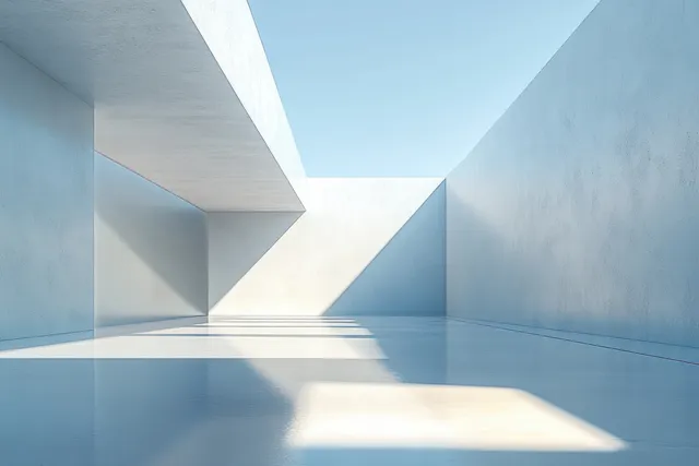 Empty minimalist concrete room with smooth walls and floor, lit by soft daylight forming geometric shadows.