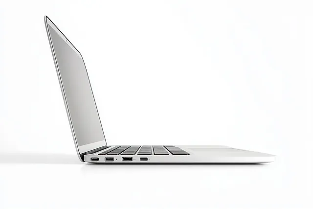 Side view of an open laptop with visible keyboard on a clean white background.