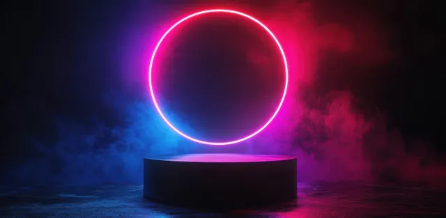 Neon circular ring lights glow over dark stage platform amid pink and blue smoke