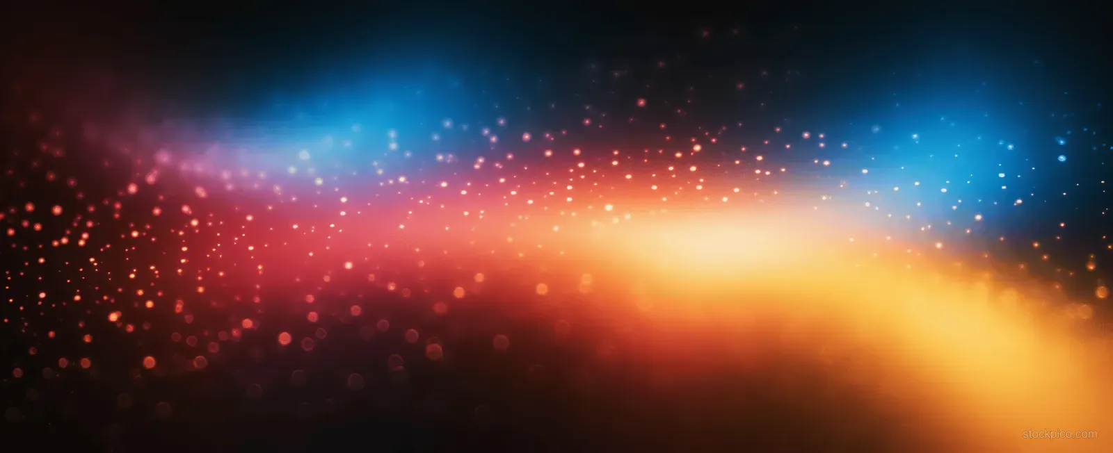 Glowing blue red yellow wave with grainy texture and dark background fills the frame.