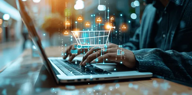 A person works on a laptop while glowing e-commerce planning charts and online shopping icons float over the screen.
