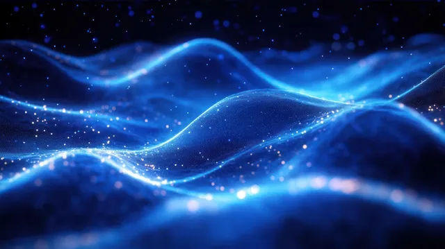 Luminous blue wave crests undulate across a dark background while sparkling light particles drift around them.