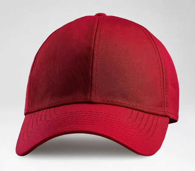Front view of a plain red baseball cap with visible stitching and a curved brim on a neutral background.