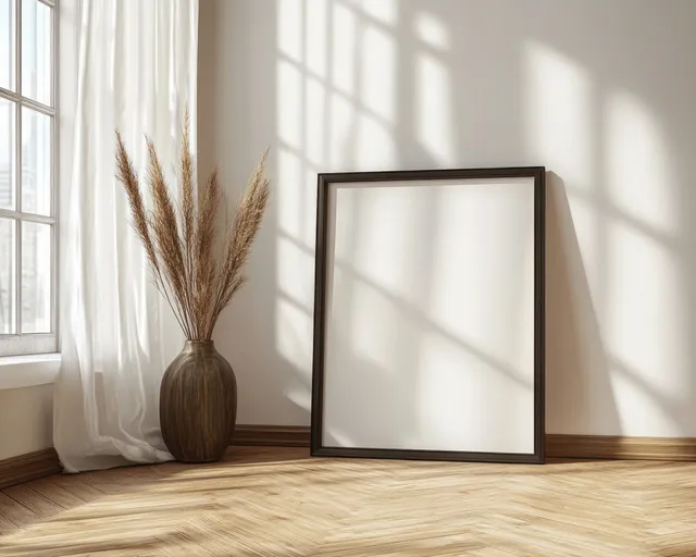 Blank picture frame mockup in bright Scandinavian interior with soft window shadows