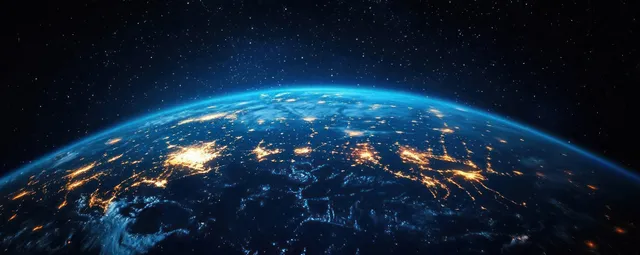 Earth from space at night with Eastern Asia glowing city lights and stars