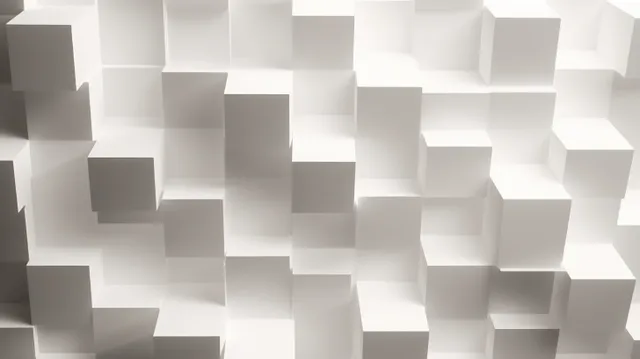 Interlocking white cubes form a minimalist wall with soft shadows and strong depth.