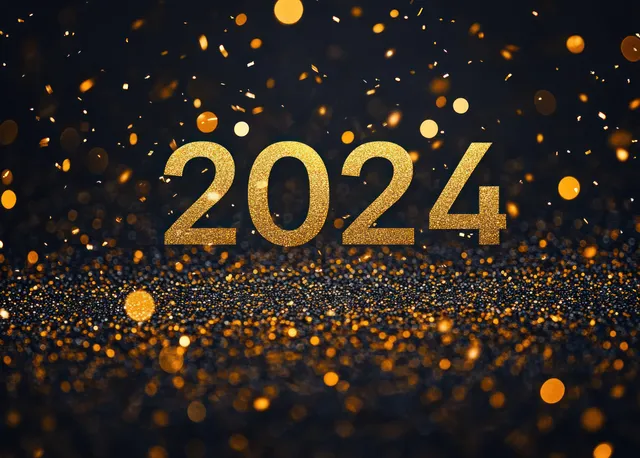 Gold 2024 number sign glowing with falling confetti on a dark, sparkling backdrop