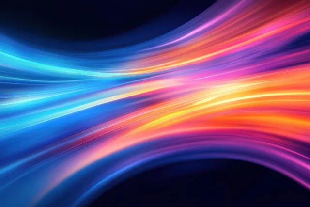 Colorful light trails swirl through a digital tunnel with neon blue, orange, and pink streaks
