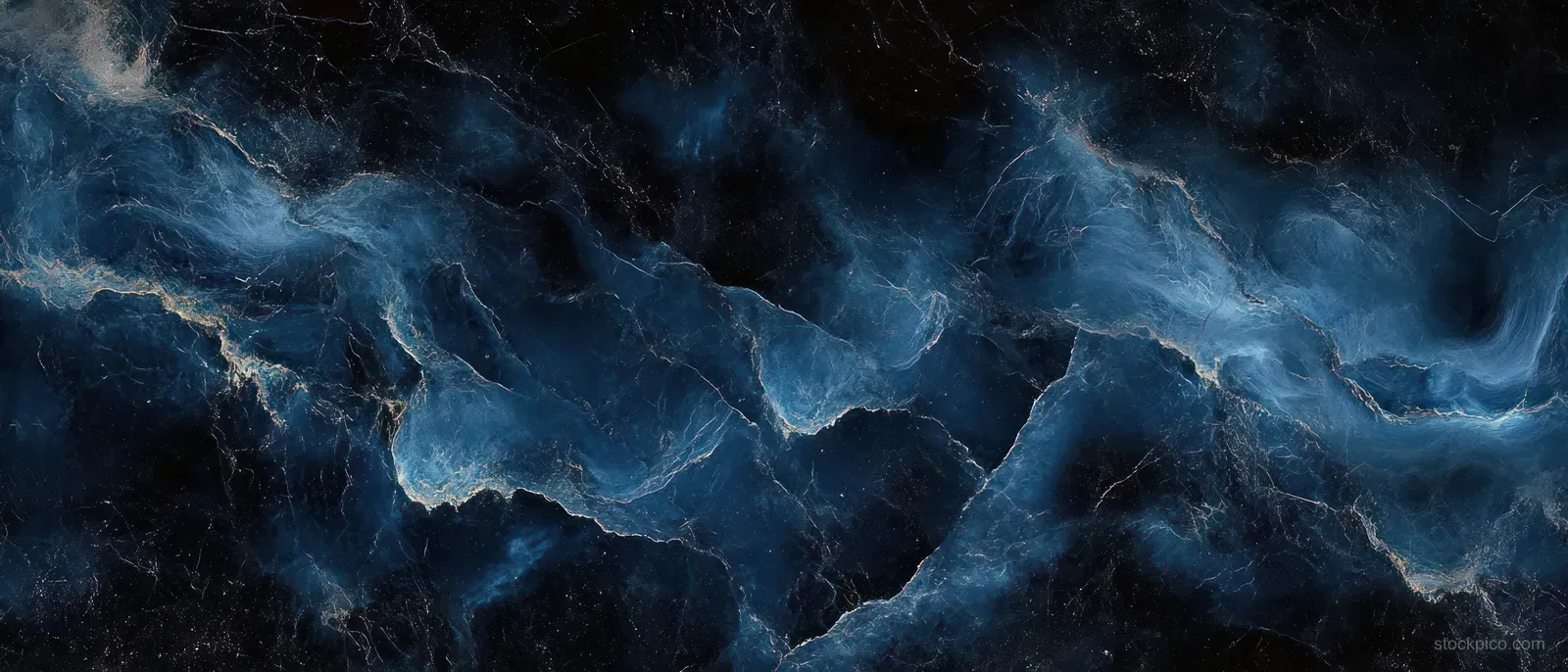 Dark blue and black marble surface with swirling glossy veins and rough cracked stone texture filling the frame.
