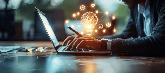 Technologist at laptop connects glowing network nodes across digital city lights at night