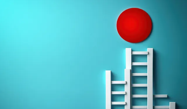 Climbing ladder toward a glowing red target ball, business growth and achievement concept