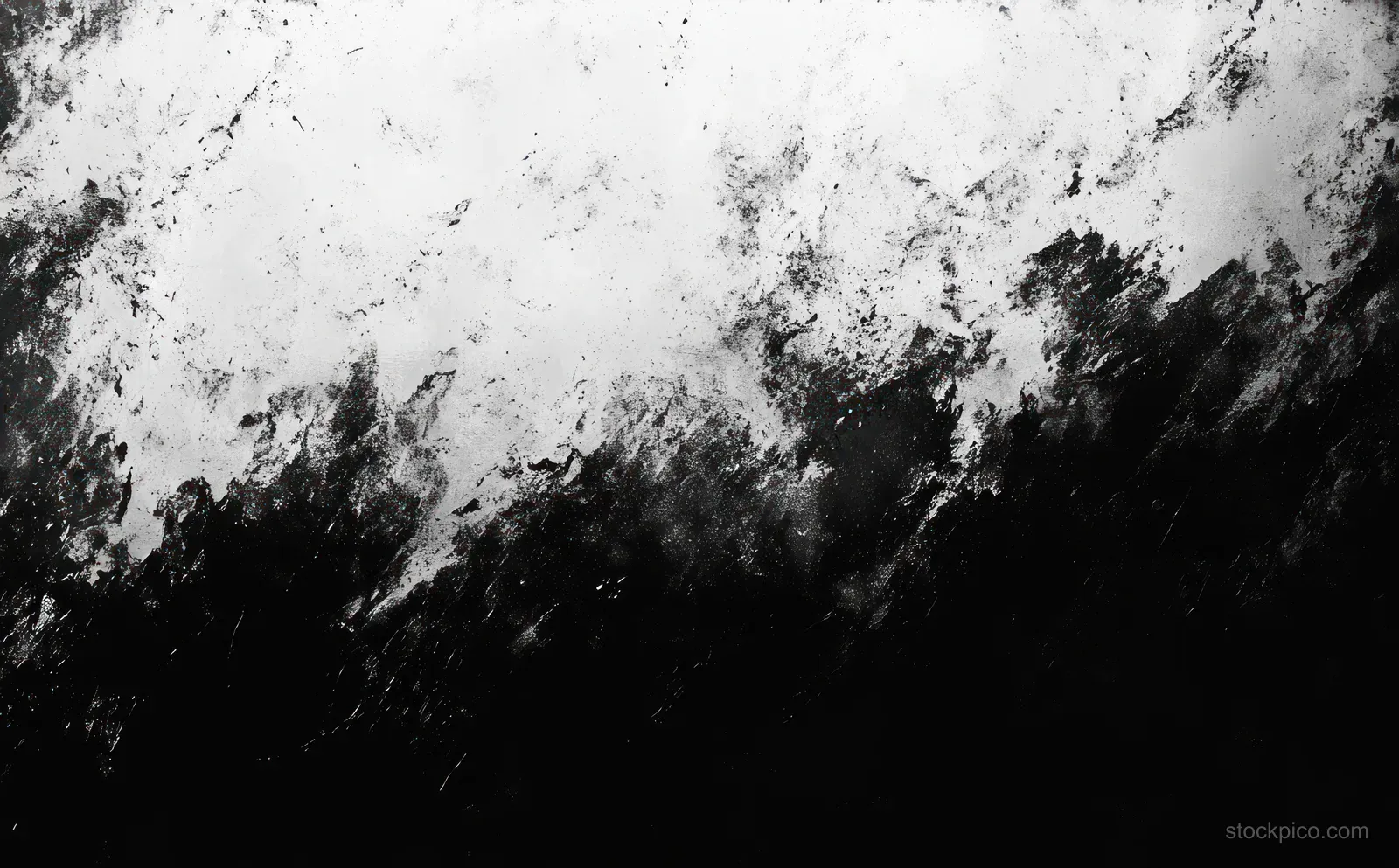 Abstract black and white textured background with rough diagonal streaks and high contrast.