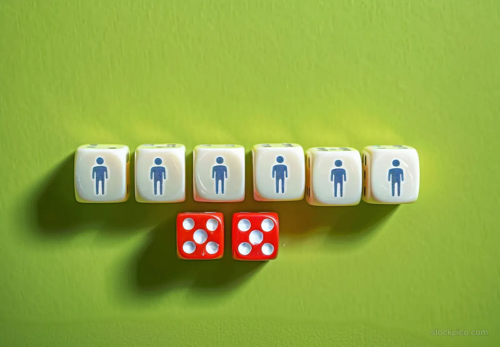 Aligned white dice with people icons sit above two red dice showing five and four on a green surface.
