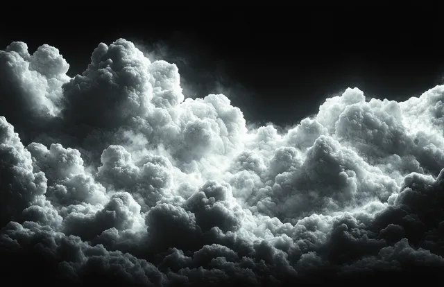 Fluffy smoke-like clouds drift across a dark black sky, glowing with misty highlights
