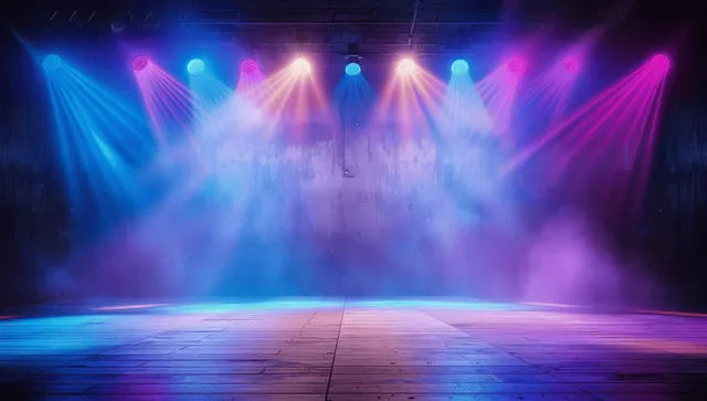 Empty concert stage with blue and purple spotlights, smoky atmosphere, and a wooden floor, perfect for event backgrounds.