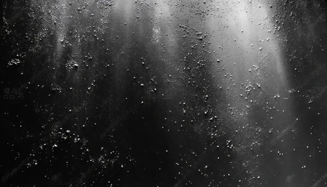 Grayscale textured abstract background with grainy speckles and faint scattered light reflections.