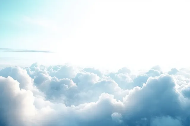 Sunlight breaks through fluffy white clouds across a bright blue sky near the horizon.