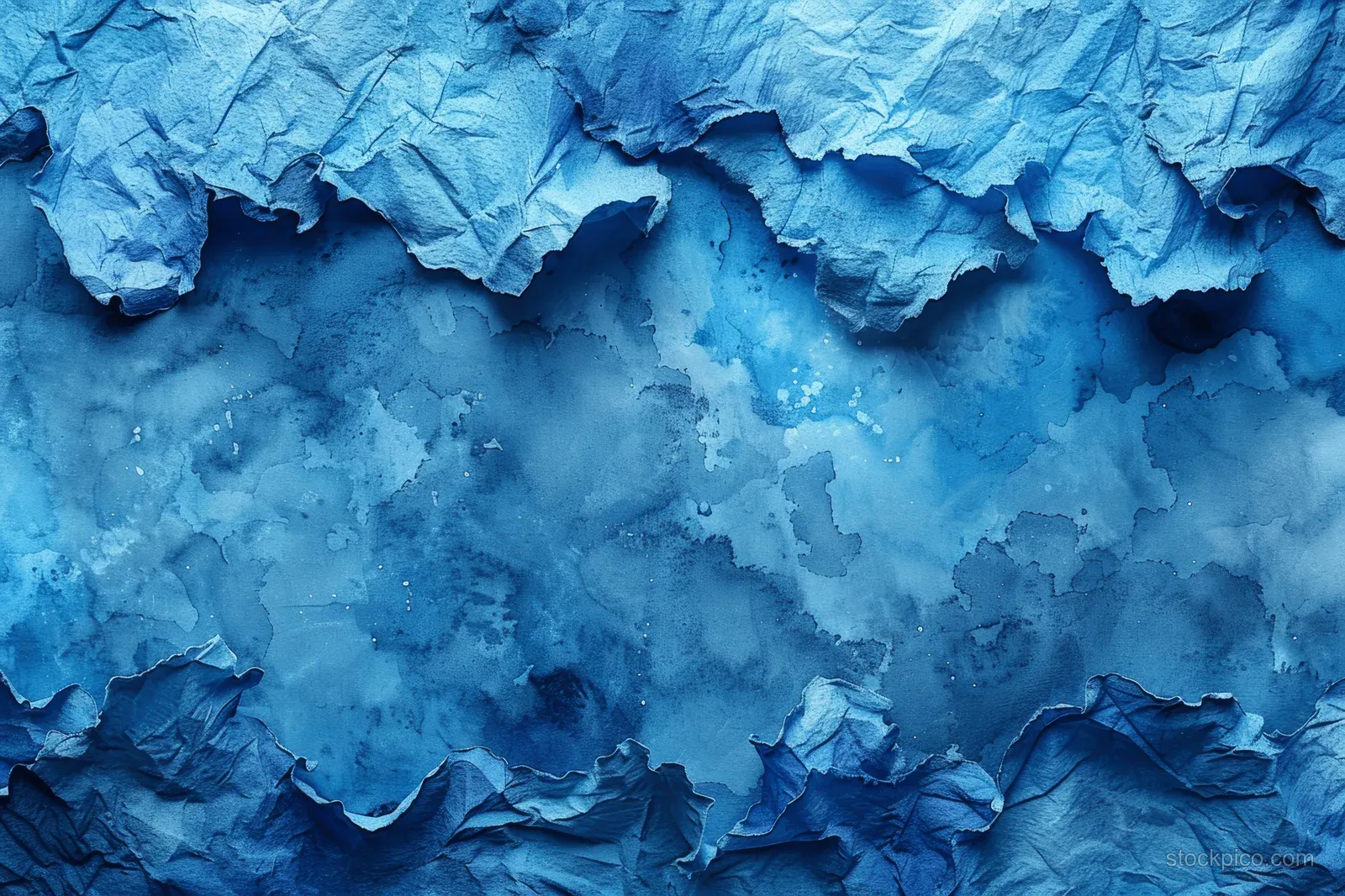 Abstract blue watercolor background with crumpled texture and white streaks resembling sky and sea.
