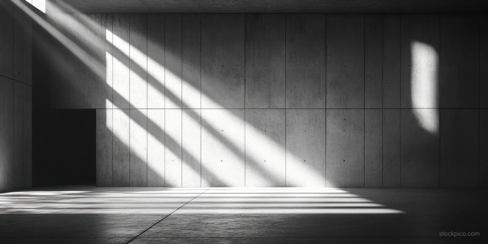 Empty concrete room interior with strong sunbeams, central opening, and rough tiled floor.