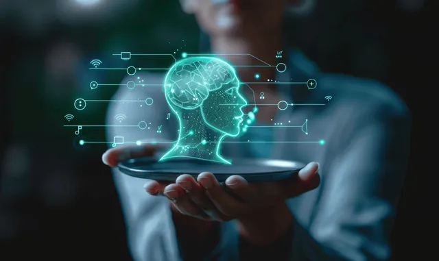 A hand holds a tablet showing a glowing AI brain icon with connected digital lines and chat speech bubbles.