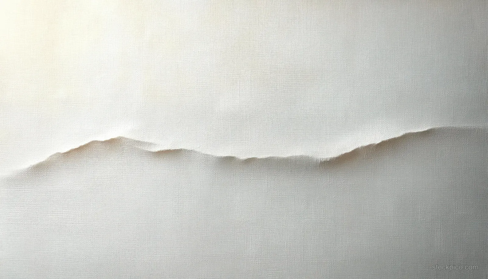 White canvas texture with soft light and subtle fabric folds on a neutral surface.