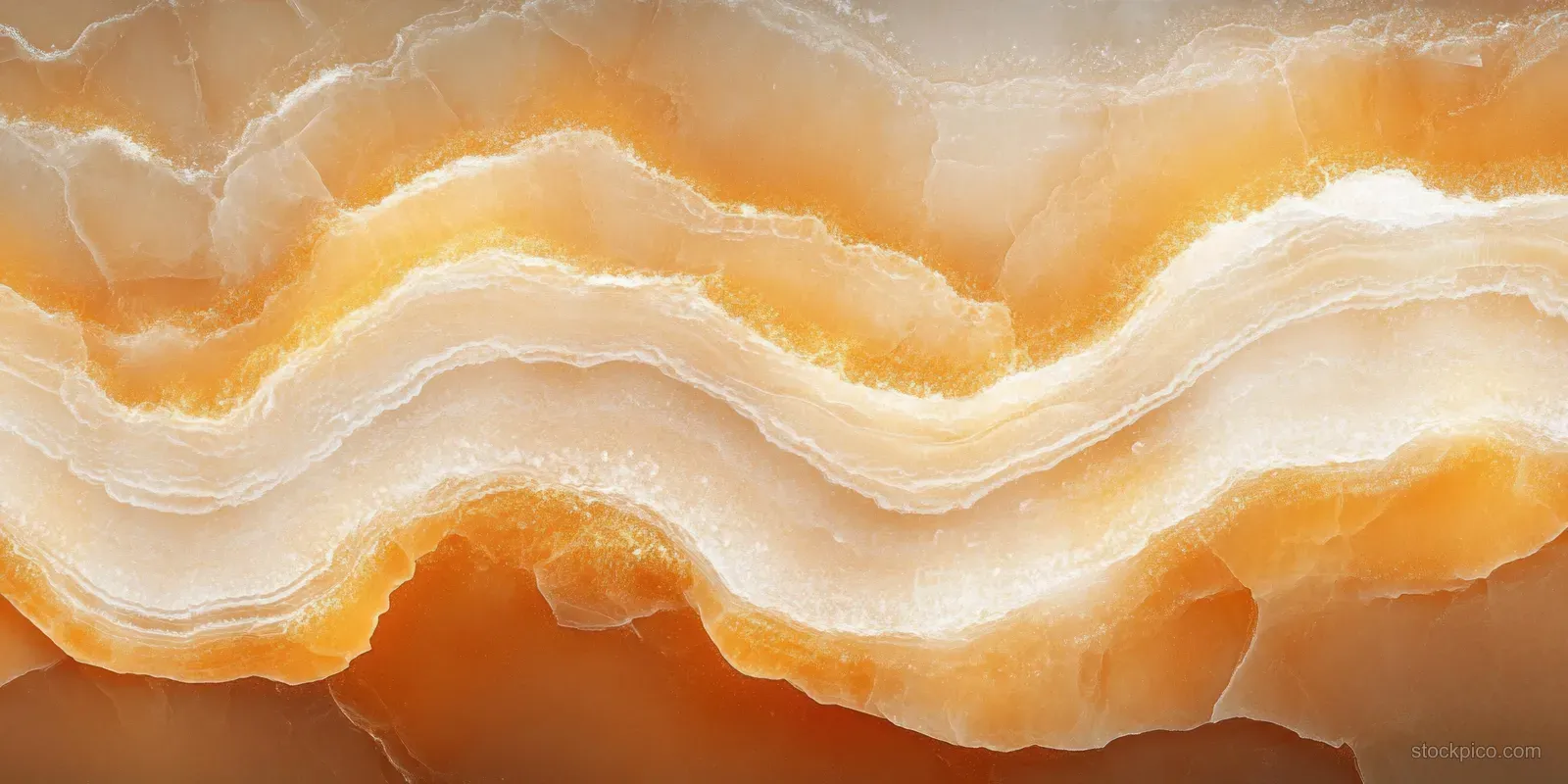 Layered orange and white crystalline stone close-up with wavy stratified bands and textured mineral surface.