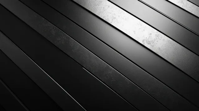Diagonal black and silver metallic grooves form an abstract high-contrast background with bright highlights.