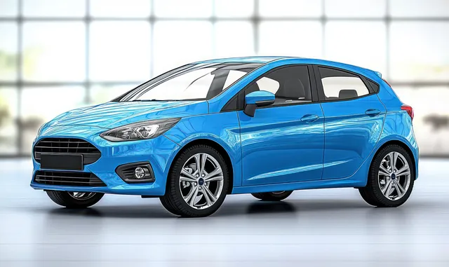 Blue hatchback car in a studio with chrome grille, alloy wheels, and reflections on a smooth floor.