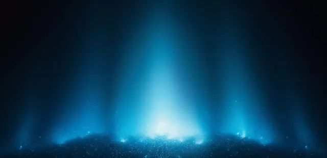 Blue glowing light beam rises from dark foggy black background with gradient rays