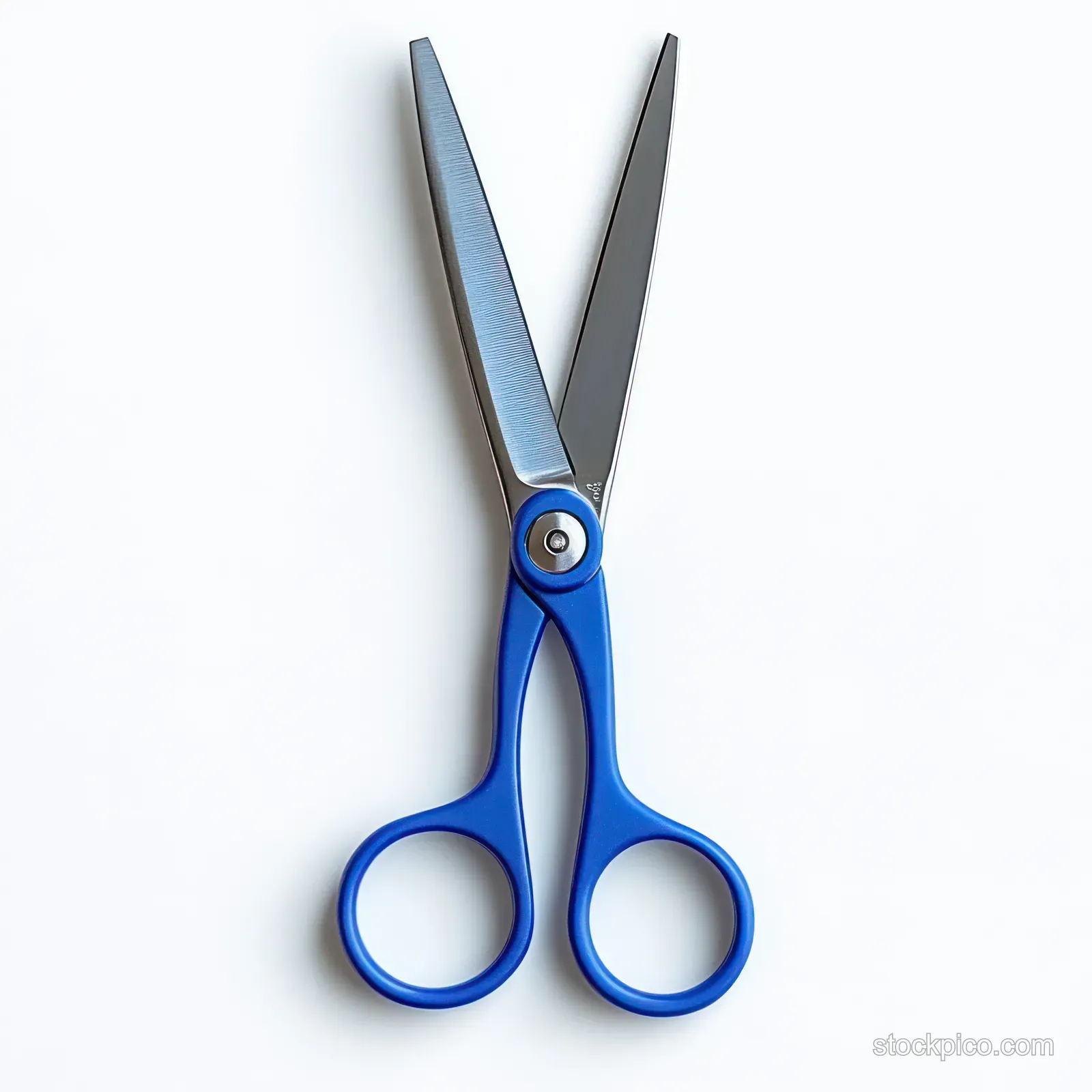 Closed blue-handled scissors with stainless steel blades isolated on a white background.