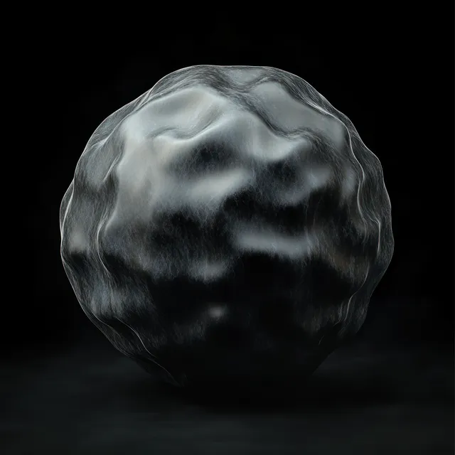 An irregular black metallic textured sphere floats in darkness with soft shadows and faint reflections.