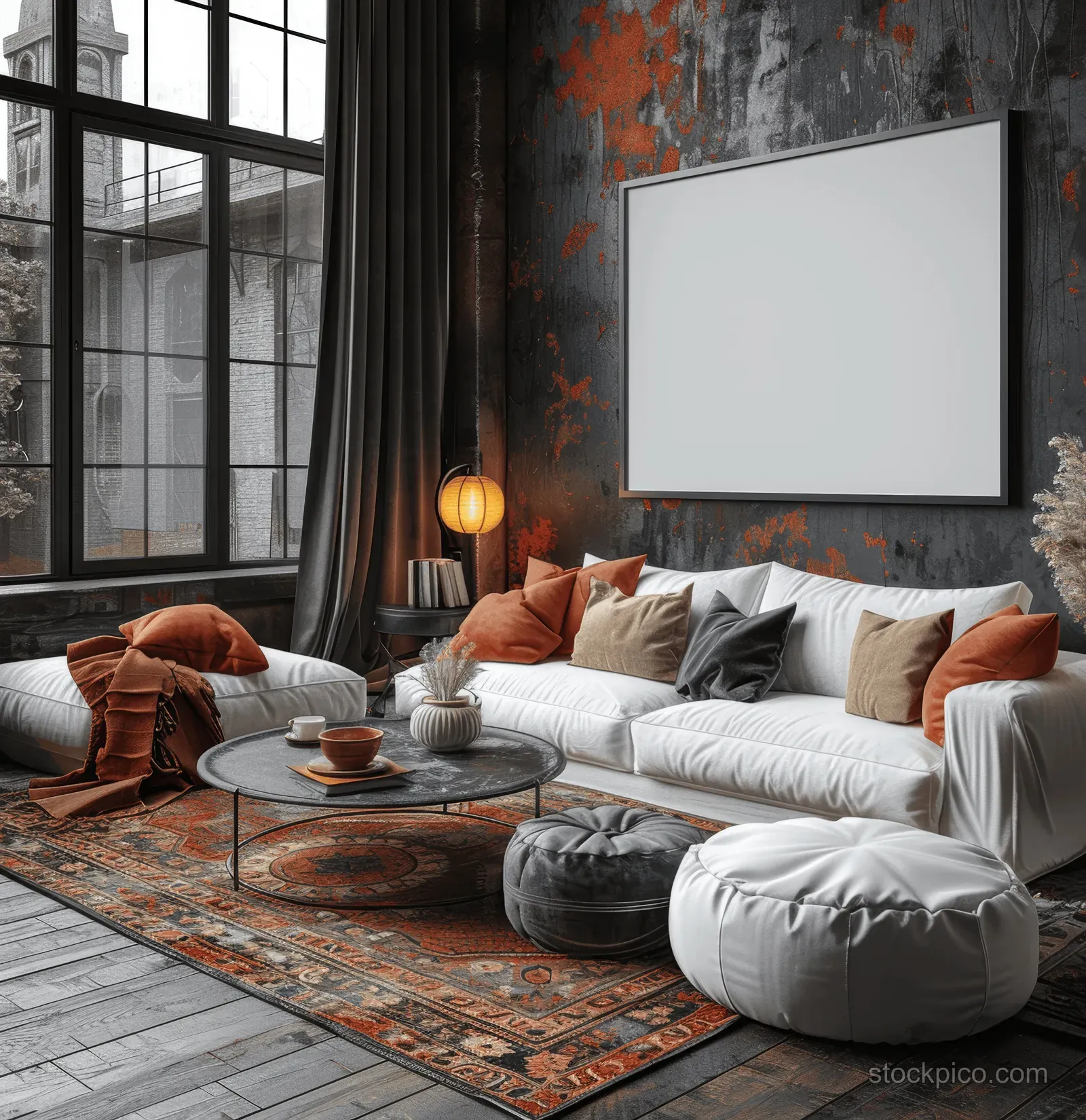 Modern living room interior with white sofa, warm table lamp, dark gray wall, and a large wall-mounted screen.