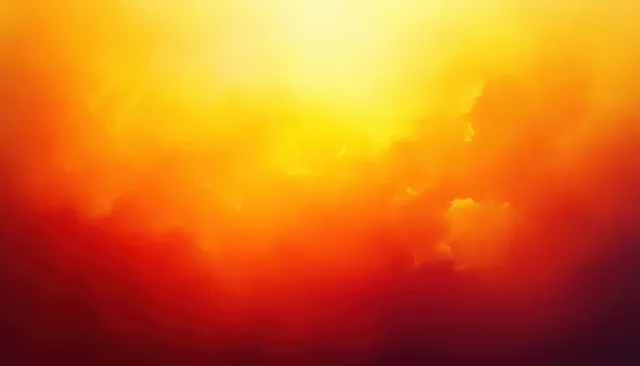 Symmetrical abstract sunrise glow spreads orange and yellow gradients through soft cloud-like haze.