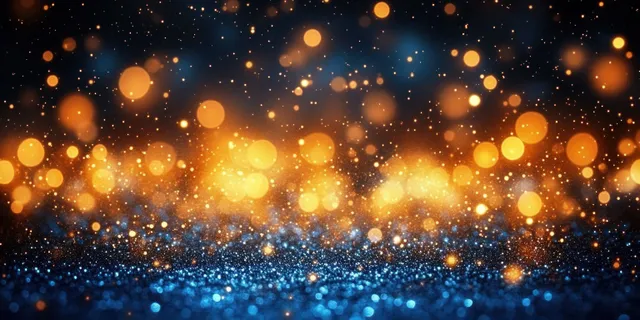 Golden and blue bokeh sparkles over dark night background with blank text space