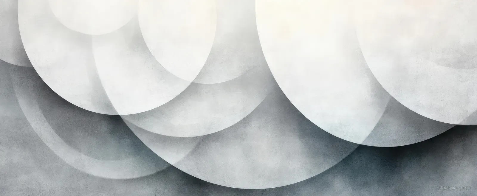 Overlapping gray and pale circles form an abstract banded pattern with soft lighting and slight worn texture.