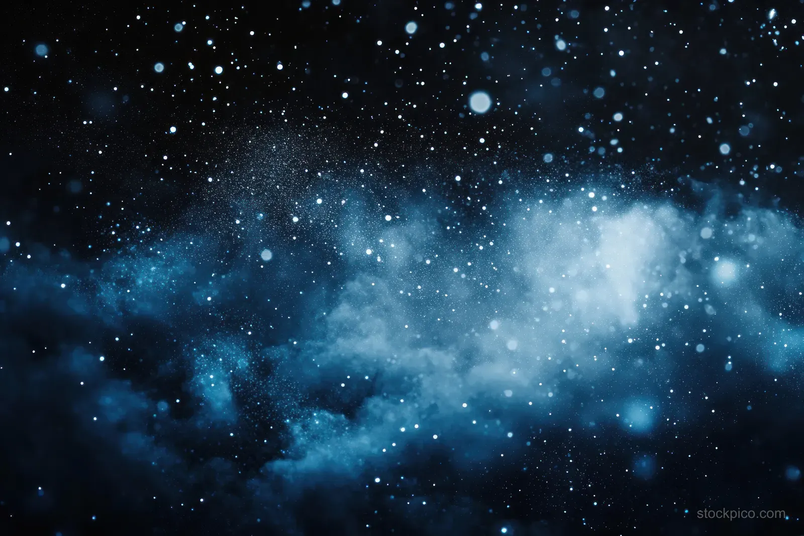 Glowing blue nebula clouds drift across a dark space background with scattered star-like particles.