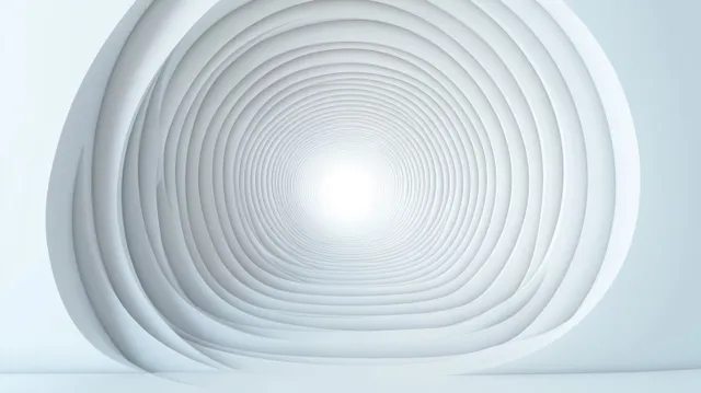 Concentric tunnel curves lead to a bright glowing point at the center of a minimal white space.