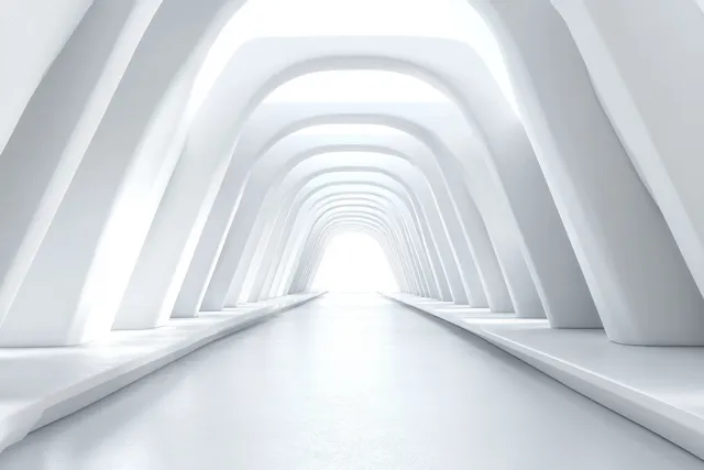 Empty futuristic hallway with repeating geometric arches in bright white and grey tones and soft light.