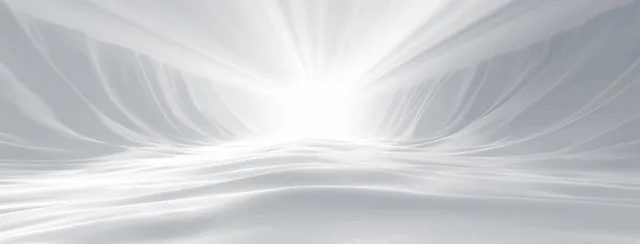 White abstract background with soft blurred light rays spreading from the center toward the edges.