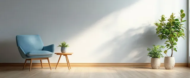 Blue chair next to a wooden side table in a bright Scandinavian interior with potted plants.