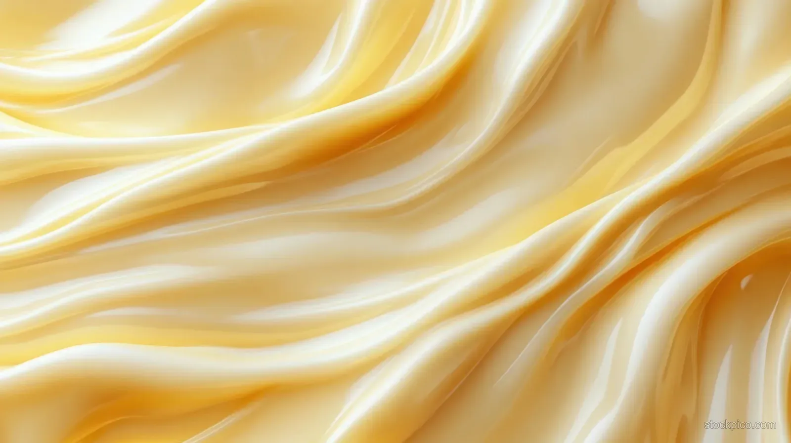 Yellow cream swirls with glossy wavy ridges spread over a beige textured background.