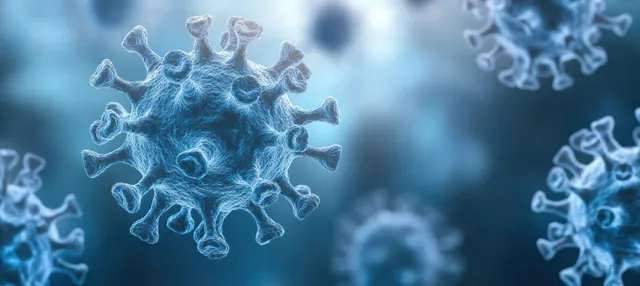 Blue 3D virus particles with spiky shapes floating in a blurred, softly lit laboratory background.