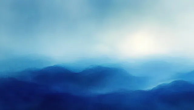 Abstract blue ocean horizon with soft gradients, misty clouds, and glowing sky light