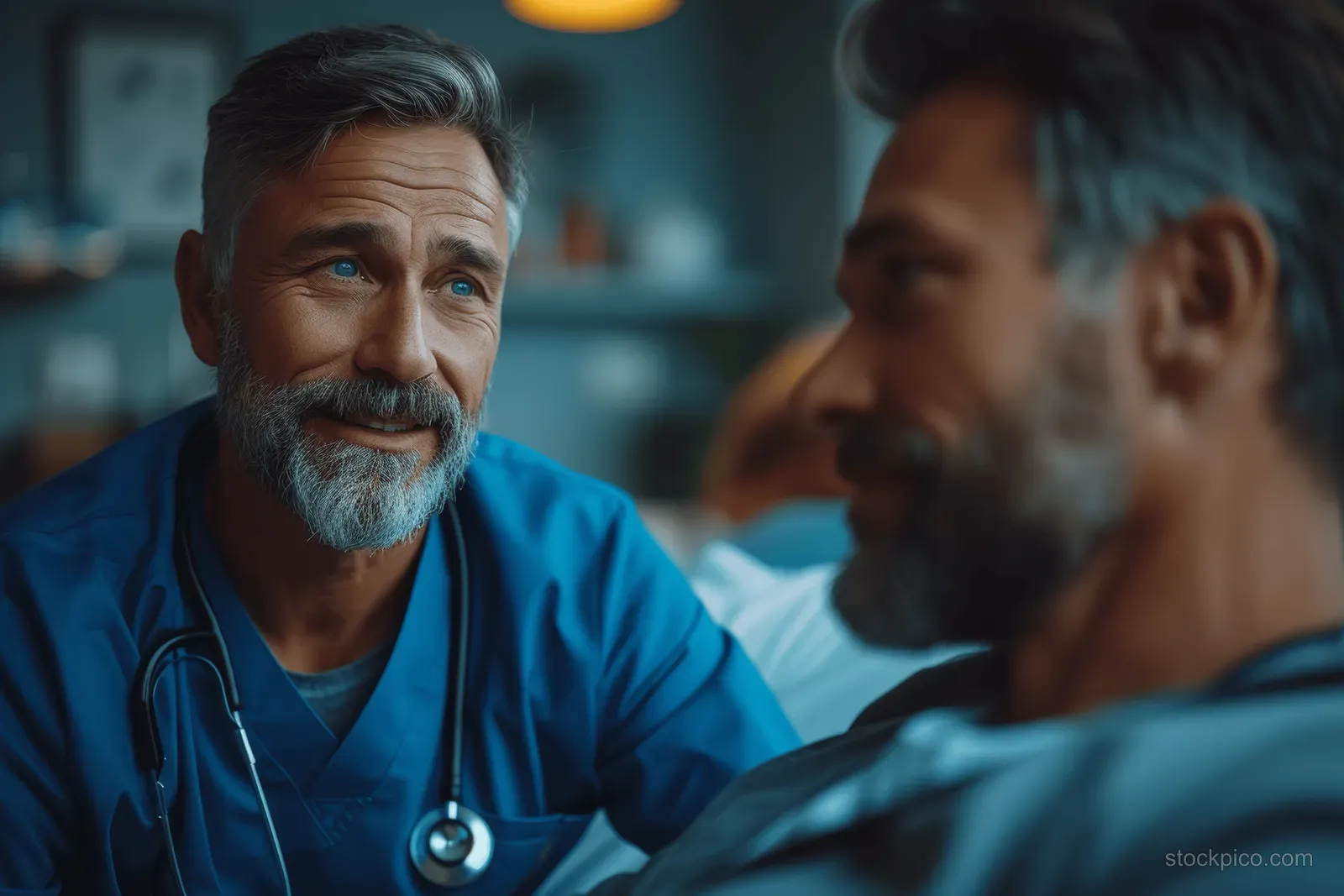 Doctor comforts a worried middle-aged patient while discussing care in a hospital room.